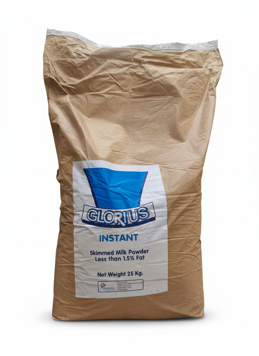 Large bag of Glorius Instant Skimmed Milk Powder with a city street in the background