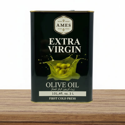 Ames Extra Virgin Olive Oil can on a wooden surface with a white background