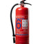 A red Fire King portable fire extinguisher with a black hose and handle, standing upright on a gray studio floor with softbox lights visible in the background.