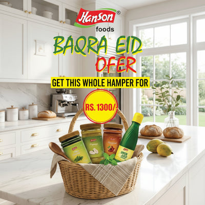 Basket of Hanson foods products with promotional text for Baqra Eid offer in a kitchen setting.