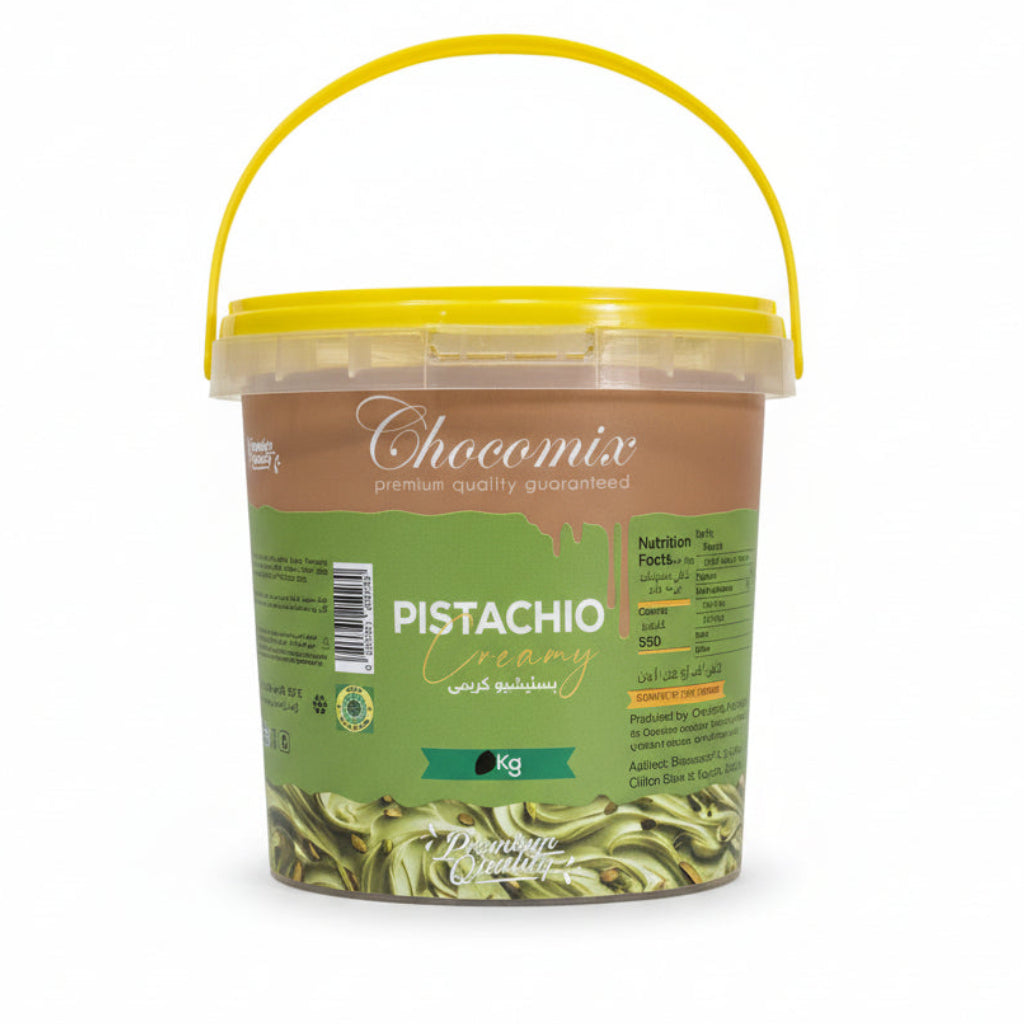 Container of Chocomix Pistachio flavor with a hand holding it.