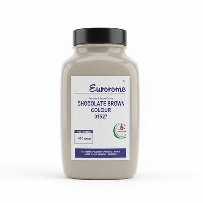 A hand holding a bottle of Eurorome Chocolate Brown Colour food coloring powder. The bottle is a translucent off-white plastic with a black cap and a white label featuring blue and green text and logos.