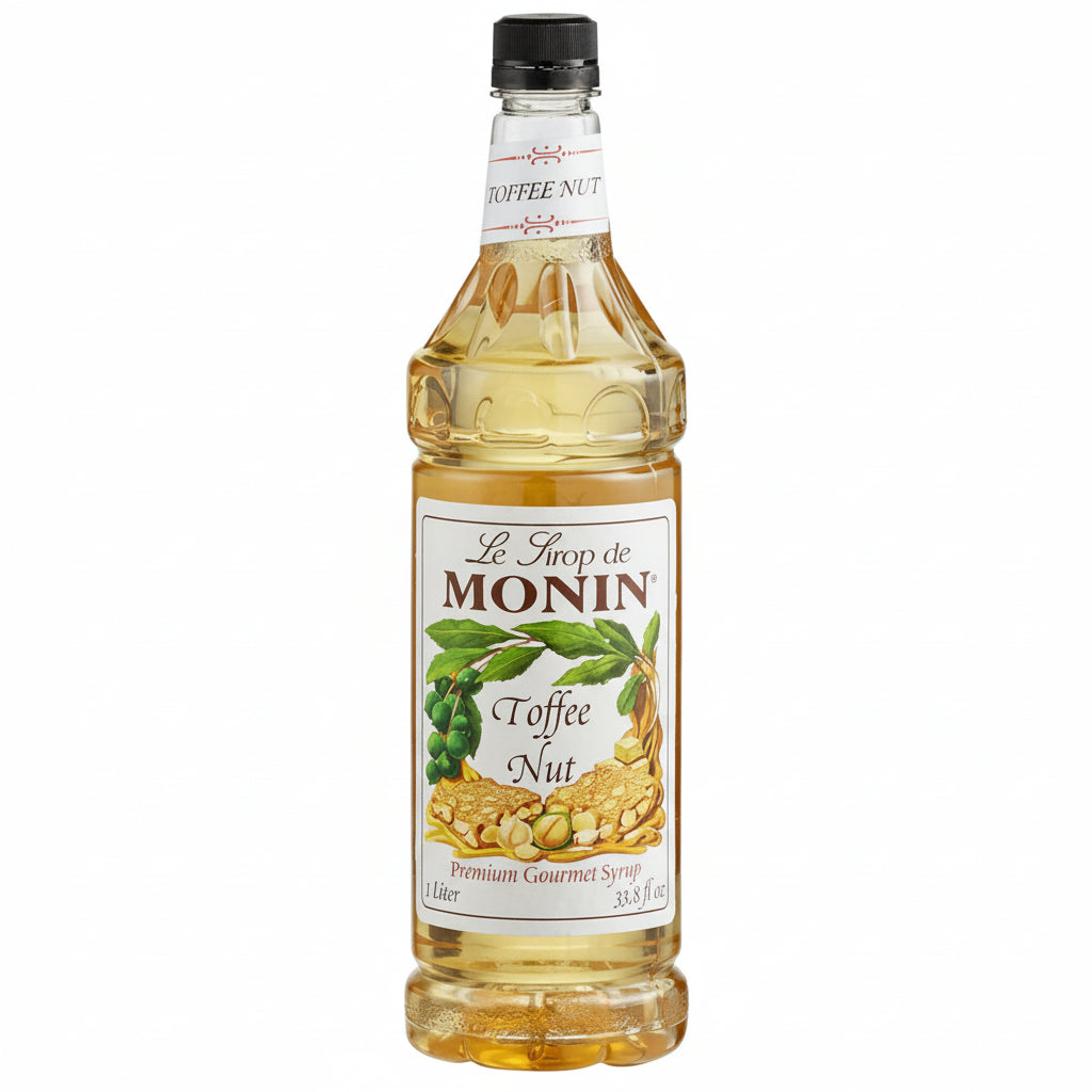 Bottle of Monin Toffee Nut syrup on a white background