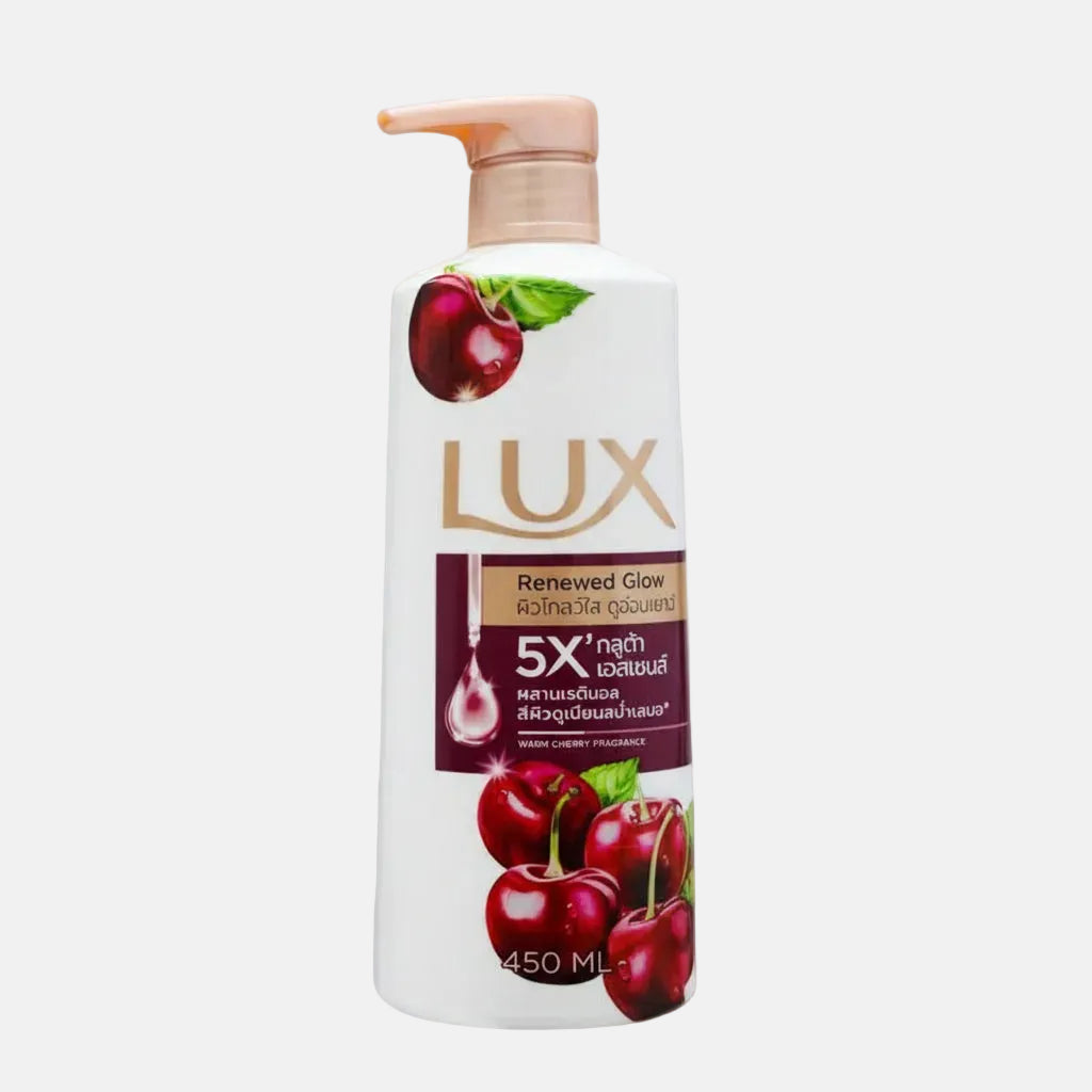 Lux body wash bottle with cherry graphics on a purple background