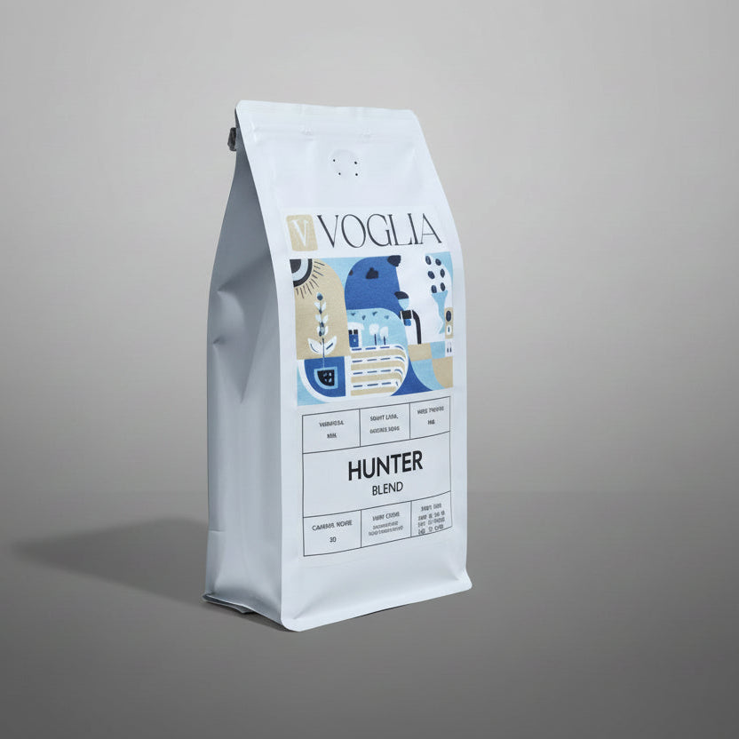 Coffee bag labeled 'Voglia Hunter Blend' on a light gray background
