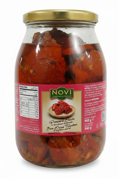 Jar of dried tomatoes with a Novi label on a white background