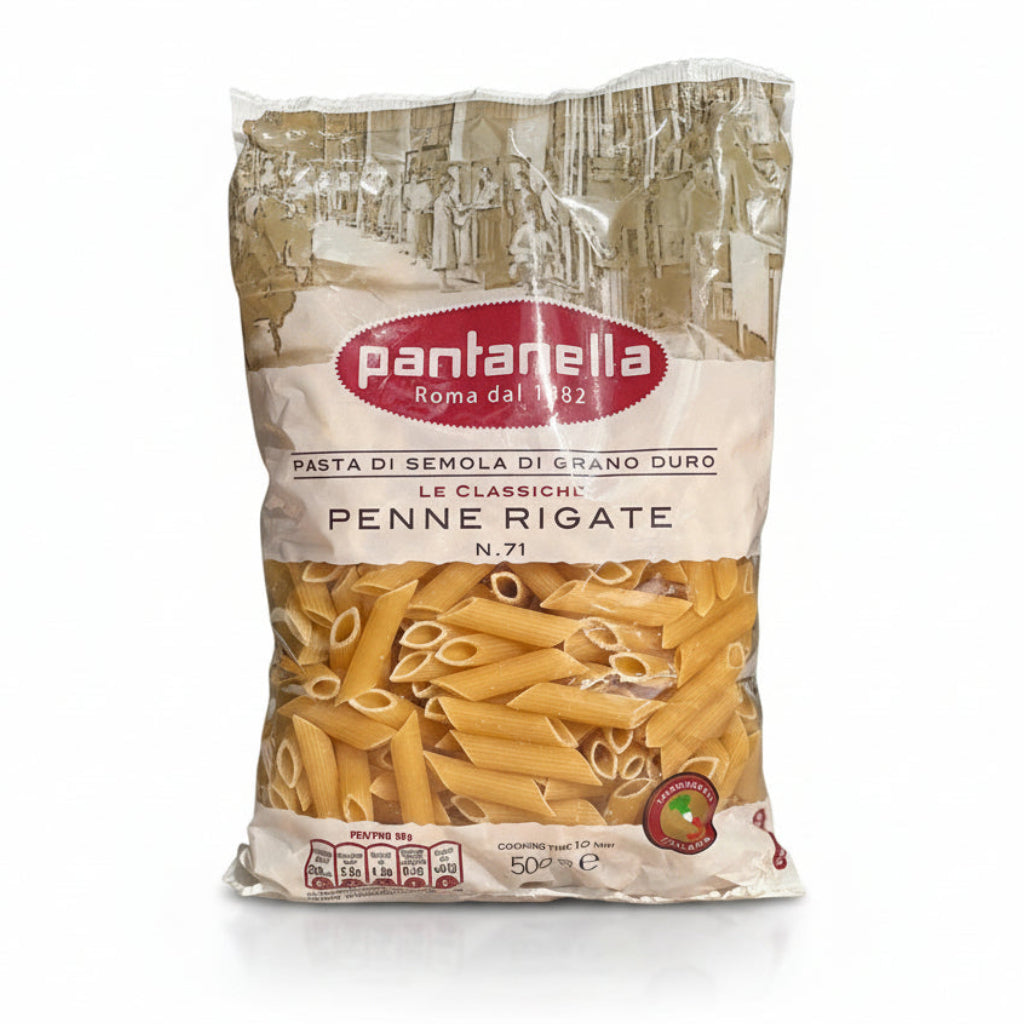 Pantanelia Penne Rigate pasta package on a blurred outdoor background